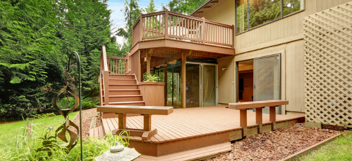 House with beautiful walkout wood deck and patio